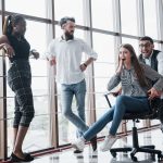 Employees play adrenaline pumping games in the office for a quick workout.